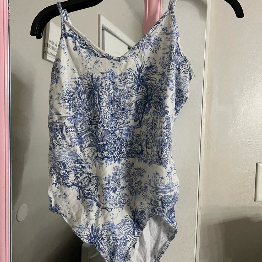White and blue bodysuit